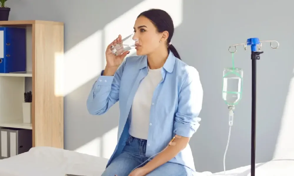 Patient receiving IV therapy in East Northport, NY to boost hydration And energy